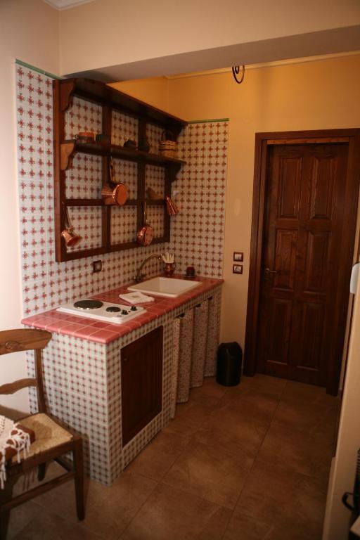 Roes Suites Káto Loutrákion Oda fotoğraf